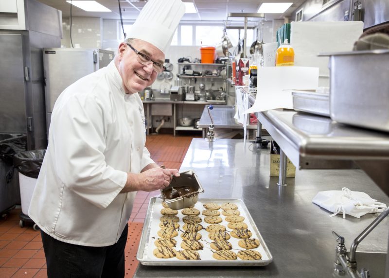 Randy Taylor decorating cookies